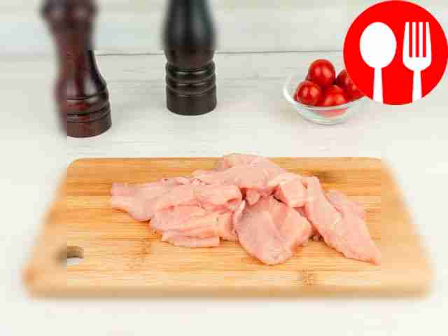 Slice the chicken fillet.