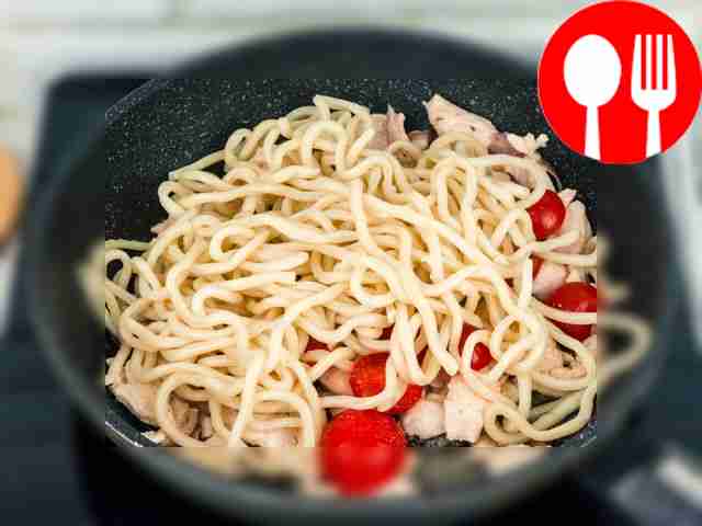 Add noodles to meat and vegetables.