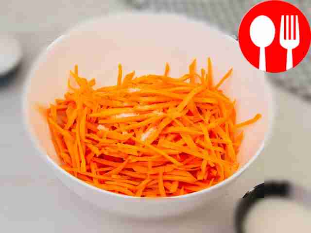Place the grated carrots in a deep bowl, add...