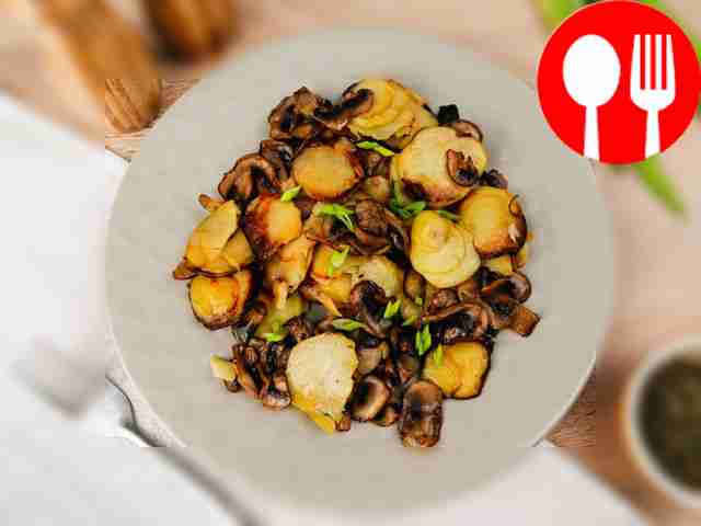 Serve the fried potatoes hot, garnished with...