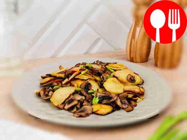 Fried potatoes with mushrooms