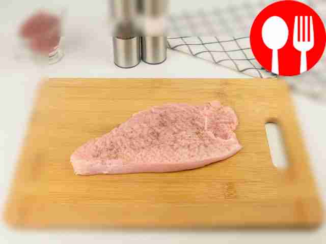 Beat the turkey meat well and add black pepper...