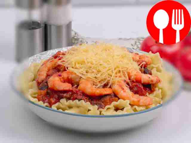Pasta with shrimp and eggplant in tomato sauce