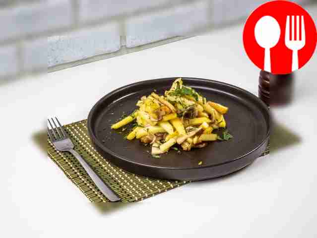 Fried potatoes with mushrooms