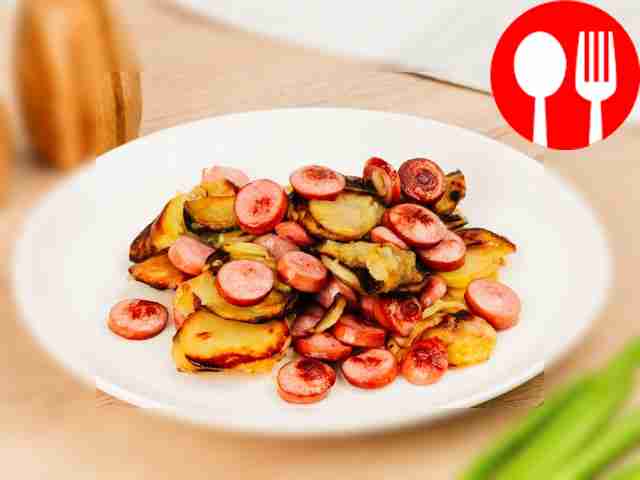 Fried potatoes with sausages