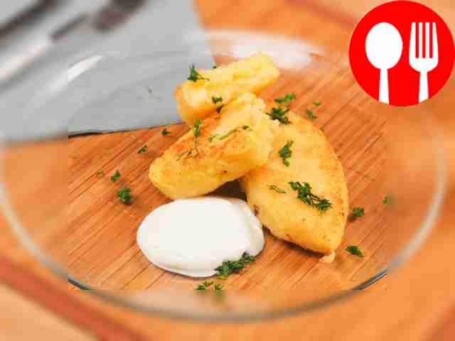 Mashed potato cutlets in a frying pan