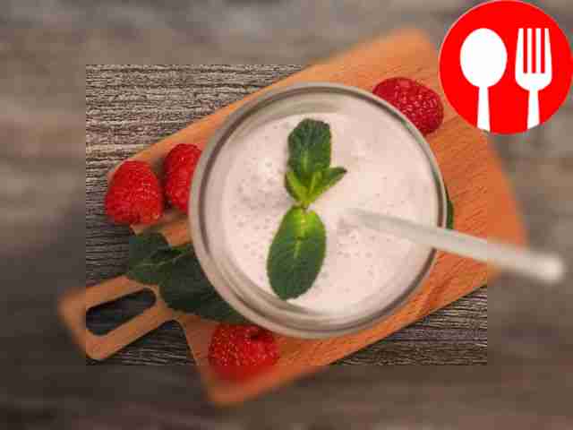 Serve the raspberry milkshake immediately...