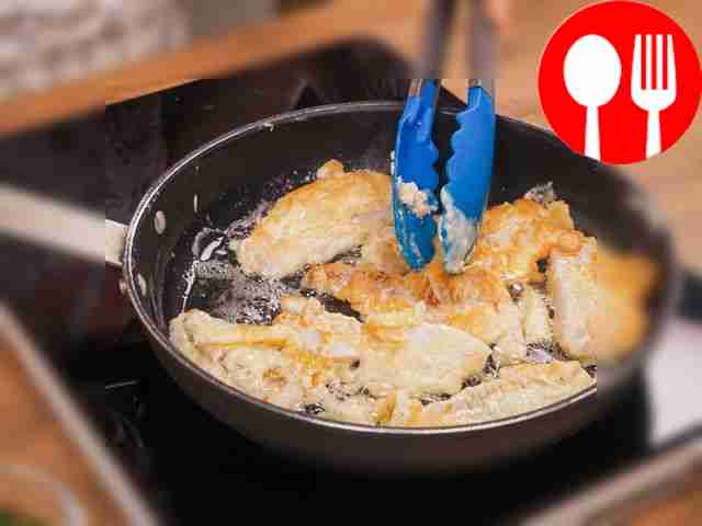 Fry pollock in batter. Heat the oil over high...