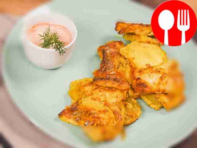 Baked pollock in sour cream and mayonnaise sauce