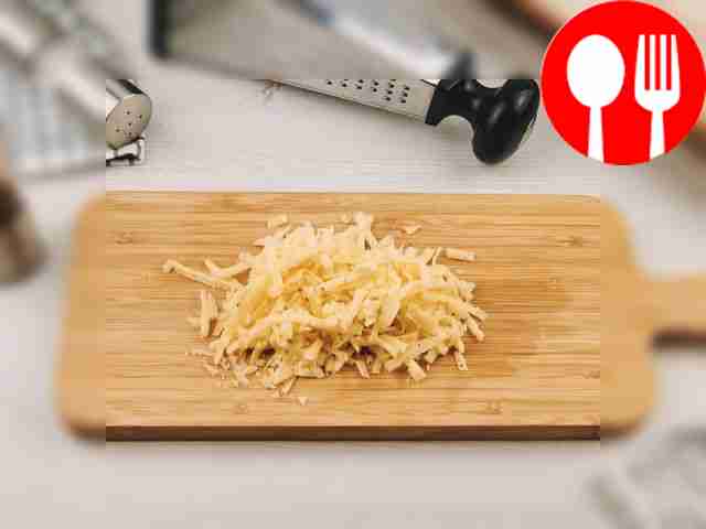 Grate the cheese on a coarse grater.