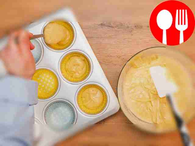 Bake cupcakes. Pour the batter into the muffin...