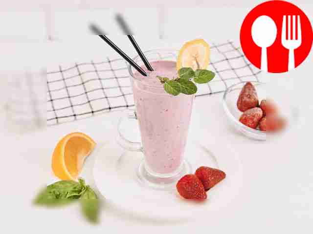Banana smoothie with strawberries and orange juice
