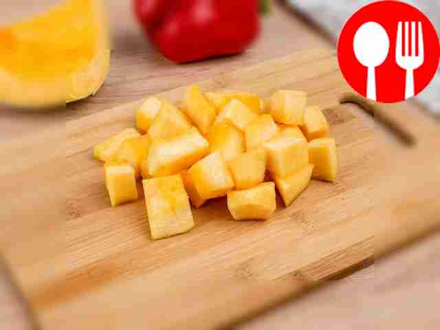 Cut the pumpkin into large cubes.