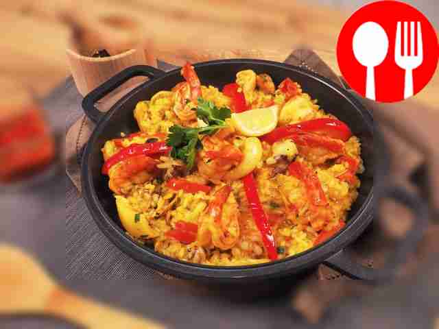 Paella with shrimp, squid, mussels and cuttlefish