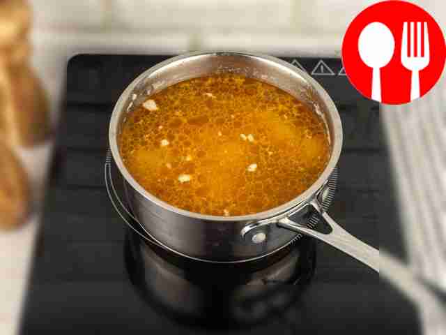 Add washed rice and adjika to the pan. Cook...