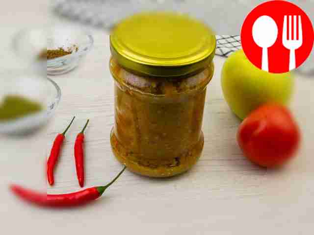 Adjika from tomatoes with apples