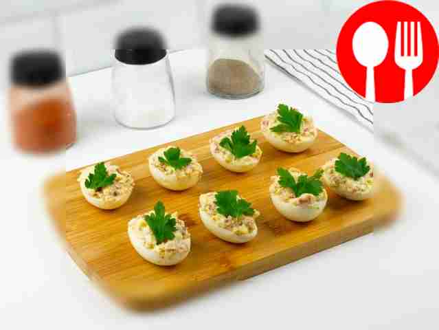 The appetizer is ready. Place the eggs on a...