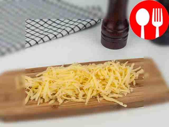 Grate the cheese on a coarse grater.