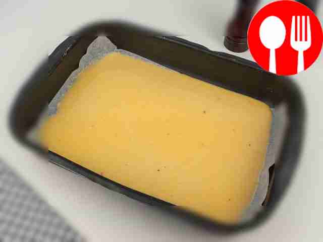 Line a baking dish with parchment, pour the...