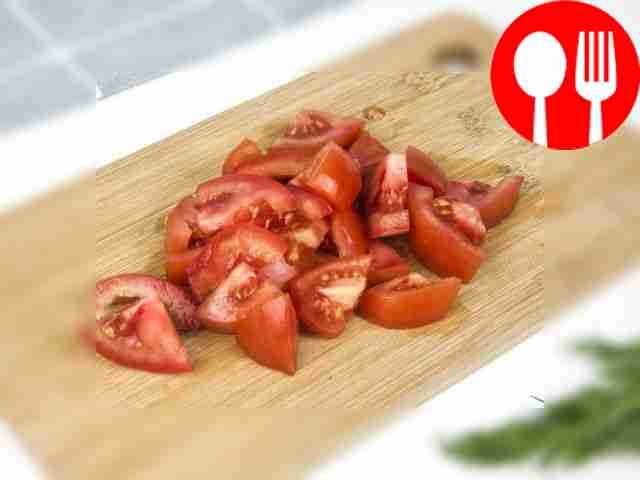 Remove the stem from the tomatoes and cut into...