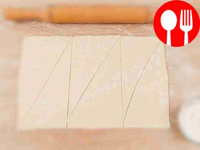 Flatten the puff pastry using a rolling pin....