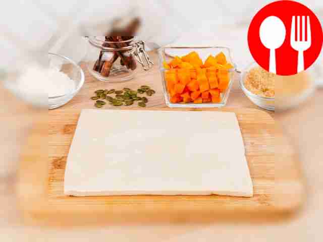 Preheat the oven to 180°C. Remove the puff...