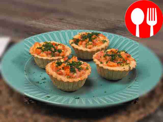 Place the finished cheese tartlets on a...