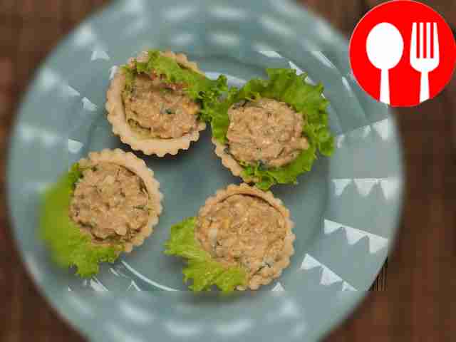 Tartlets with cod liver and cucumber