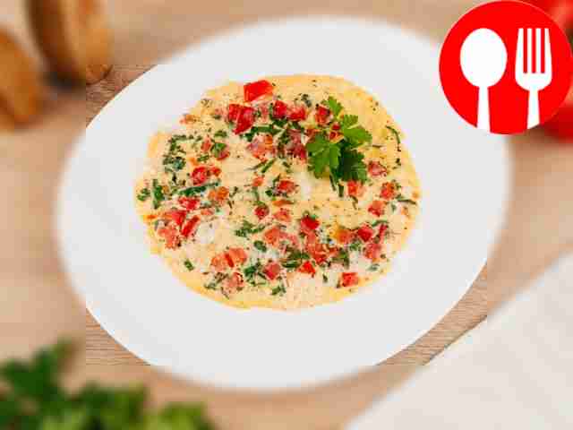 Omelette with tomatoes and herbs