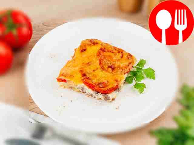 Casserole of zucchini and minced meat under a cheese cap