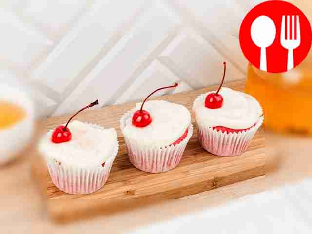 Remove the cupcakes from the oven and let them...