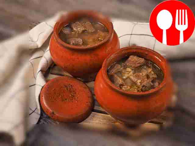Veal with potatoes in a pot