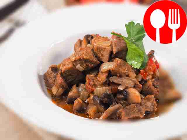 Телятина с шампиньонами