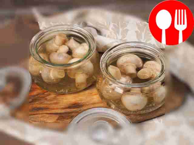 Marinated champignons in a jar for the winter