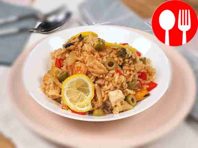 Paella with seafood and chicken