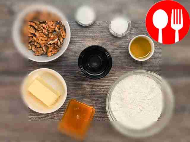 Grind the walnuts in a blender or with a...