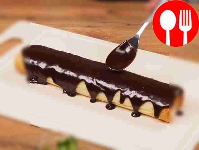 Assemble the roll. Unroll the dough. Coat the...