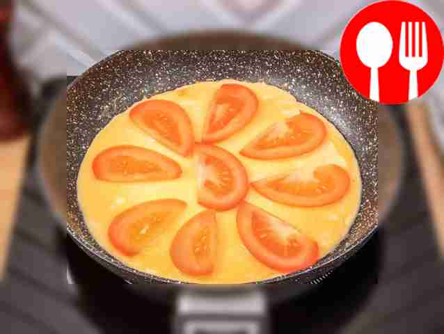 Place tomato slices on top of the omelette....