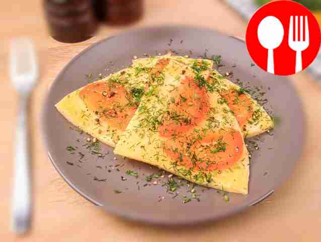 Decorate the finished omelette with chopped dill.