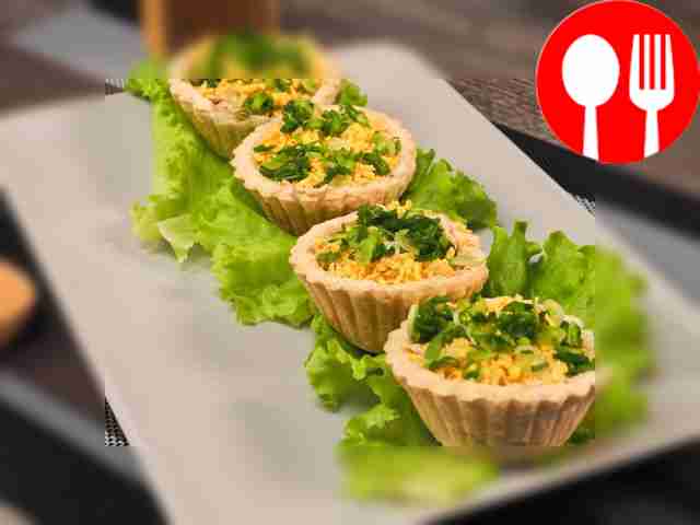 Tartlets with cod liver and cheese