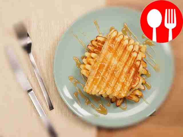 Pour chocolate syrup over tender milk wafers.