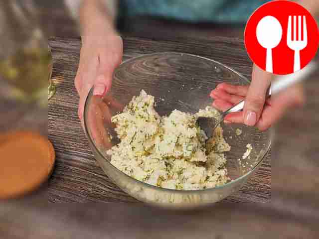 Prepare the filling. Grind the Adyghe cheese...