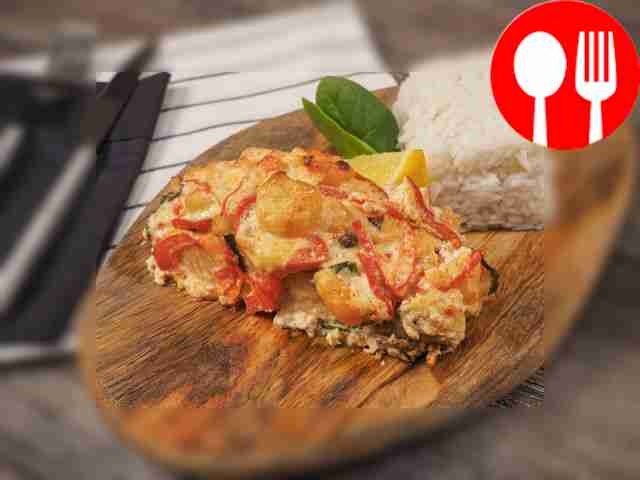 Salmon with shrimps in creamy sauce