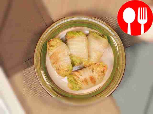 Serve Chinese cabbage rolls, pour sour cream...