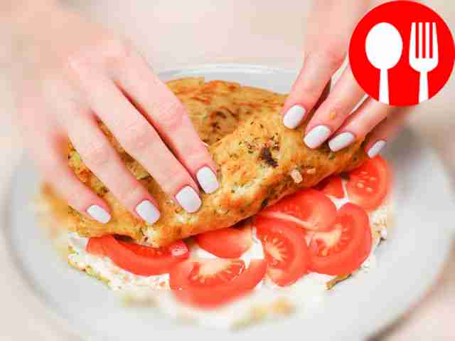 Form a cake from zucchini pancakes. Grease the...