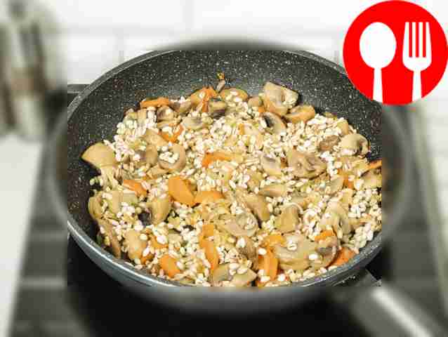 Add pearl barley to the pan, after draining...
