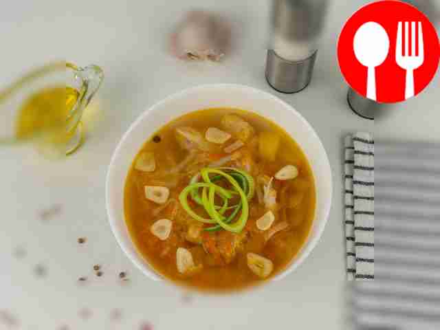 Sauerkraut cabbage soup with chicken