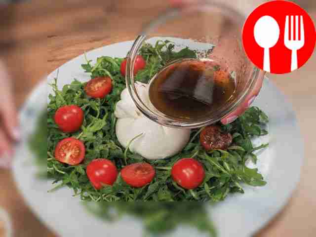 Place arugula and tomatoes on a flat plate....