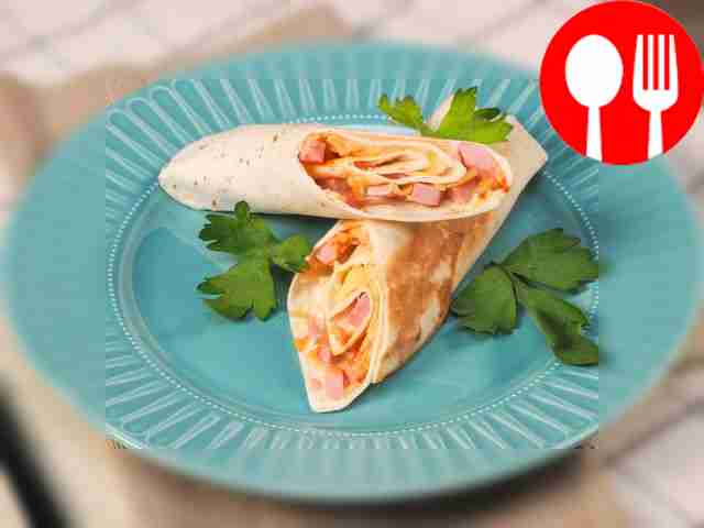 Fried pita bread with sausage and cheese