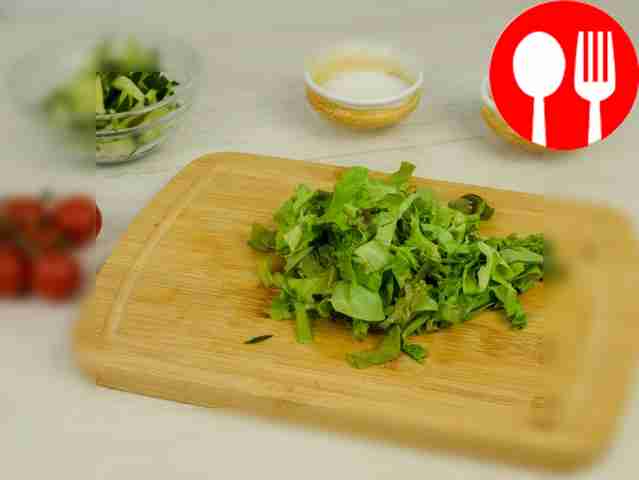 Tear the lettuce leaves with your hands or...